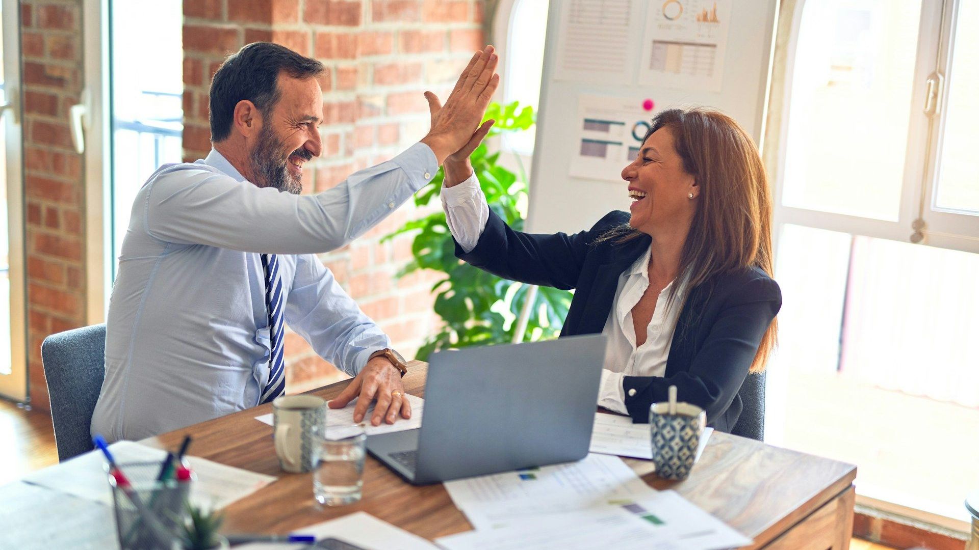 A marketing team reviewing campaign performance together